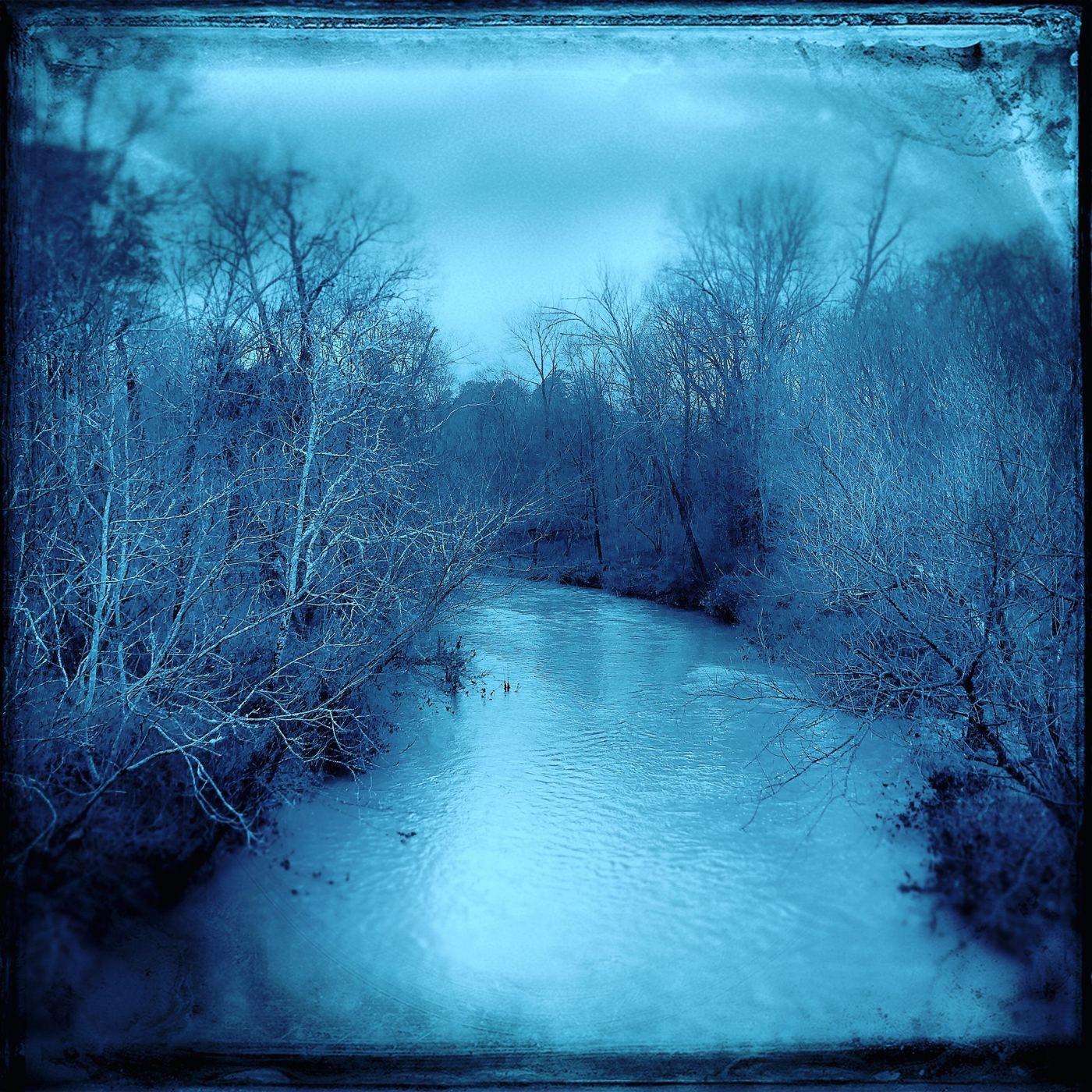 A snowy creek in bright blue